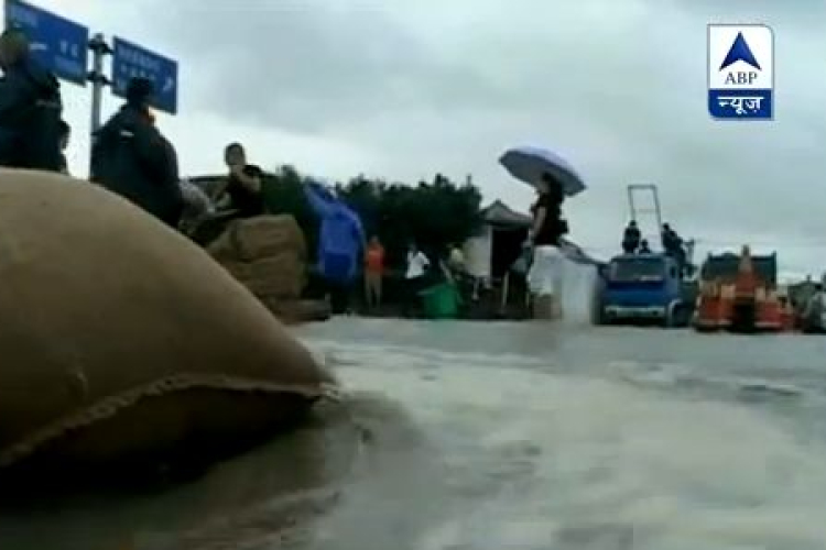 Halottak, romok a Fitow tájfun nyomában